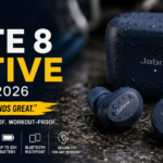 Jabra Elite 8 Active wireless earbuds and charging case with water droplets, highlighting waterproof, durable design and workout-ready performance on a dark background